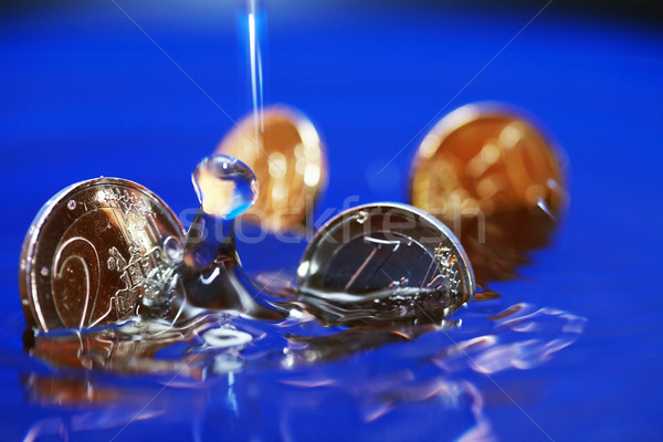 Stock photo: Sinking Coins