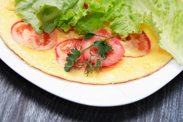 Omelet With Tomatoes Stock photo © cosma