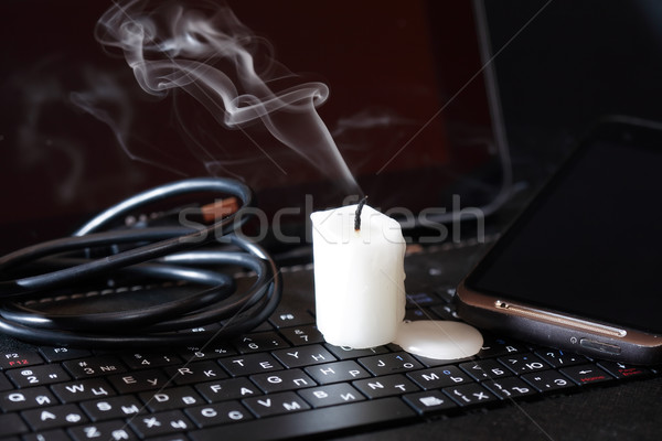 Candle On Computer Stock photo © cosma