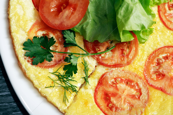 Omelet With Tomatoes Stock photo © cosma