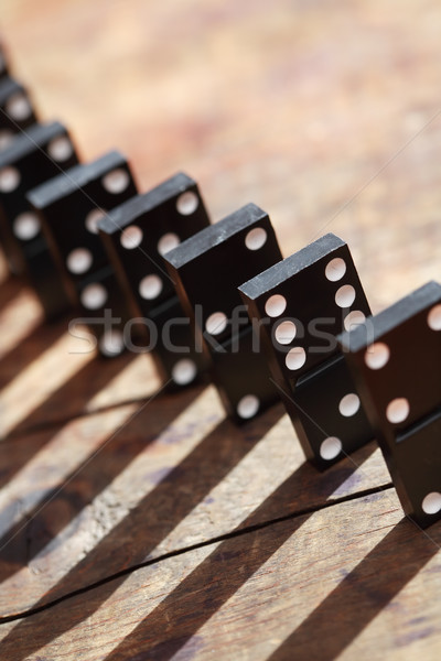 Dominó alapelv fekete áll csetepaté fából készült Stock fotó © cosma