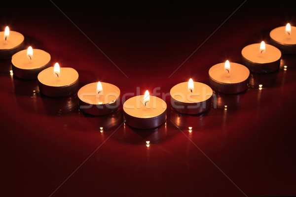 Stockfoto: Kaarsen · donkere · ingesteld · verlichting · rij · vlam