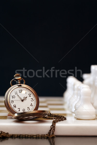 Tempo xadrez jogo vintage relógio de bolso tabuleiro de xadrez Foto stock © cosma
