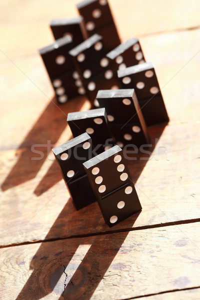 Domino Prinzip schwarz stehen Zeile Holz Stock foto © cosma