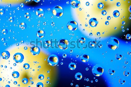 Picături portocaliu abstract albastru picături de apă Imagine de stoc © cosma
