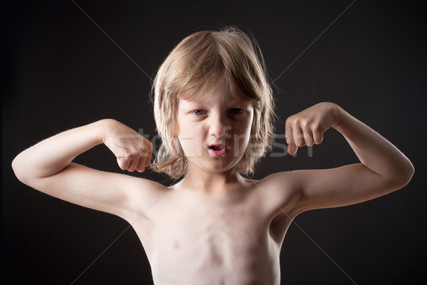 Boy Showing his Muscles Stock photo © courtyardpix