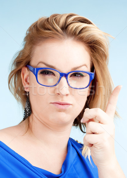 Jeune femme blond cheveux verres doigt Photo stock © courtyardpix