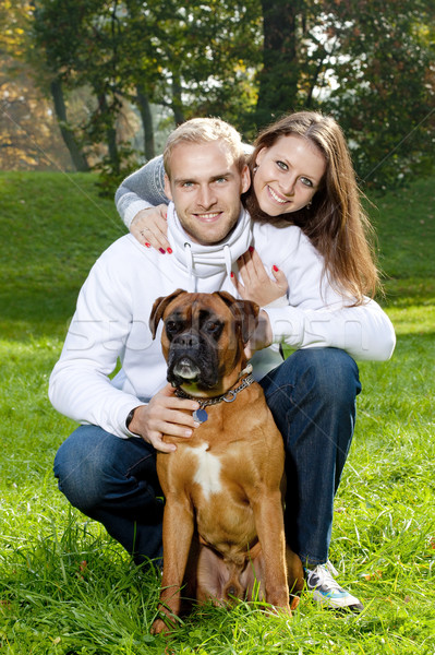 happy young couple with dog Stock photo © courtyardpix