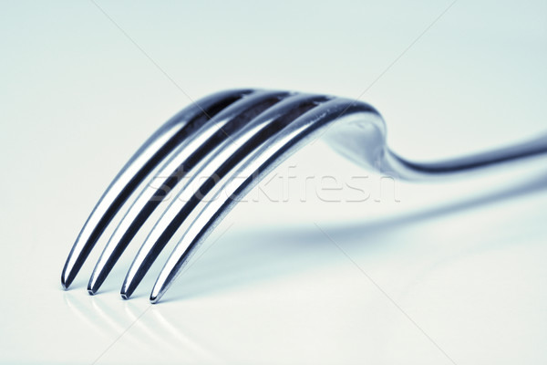 Primer plano tenedor extrema azul metal Foto stock © courtyardpix