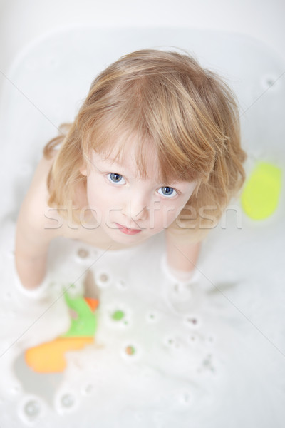 Fiú fürdőkád hosszú haj áll felfelé néz Stock fotó © courtyardpix