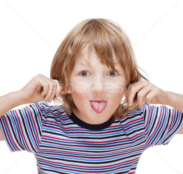 Boy with Blond Hair Sticking out his Tongue  Stock photo © courtyardpix