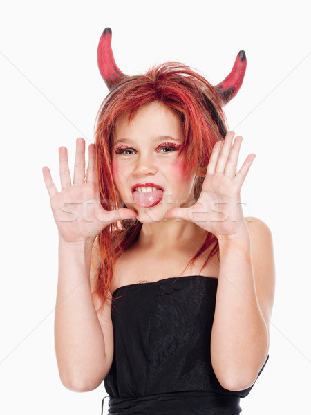 Jeune fille perruque posant diable portrait visage Photo stock © courtyardpix