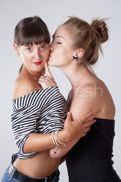 Two Young Female Friends Embracing  Stock photo © courtyardpix