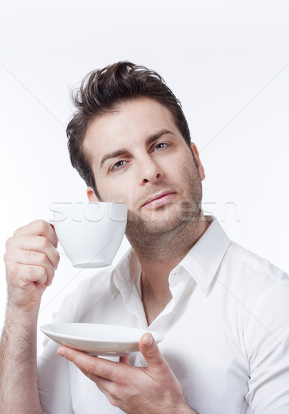 man holding cup of coffee Stock photo © courtyardpix