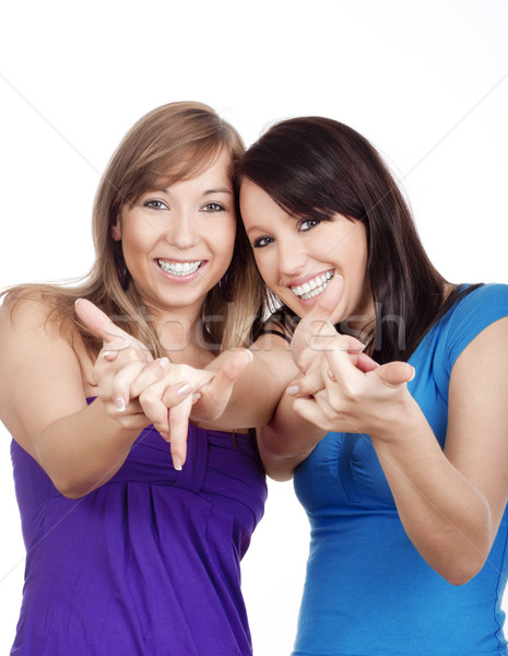 Fiatal nők mosolyog kettő boldog készít gesztusok Stock fotó © courtyardpix