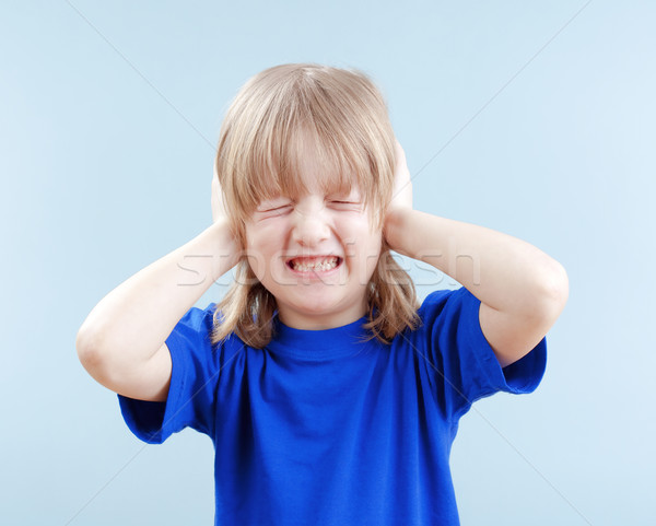 boy covering his ears Stock photo © courtyardpix