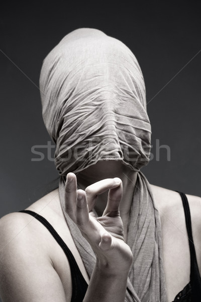  Woman Covering Face with Cloth, Making Hand Sign  Stock photo © courtyardpix