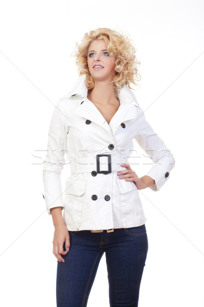young woman in red coat Stock photo © courtyardpix