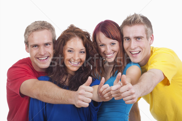 young people showing thumbs up Stock photo © courtyardpix