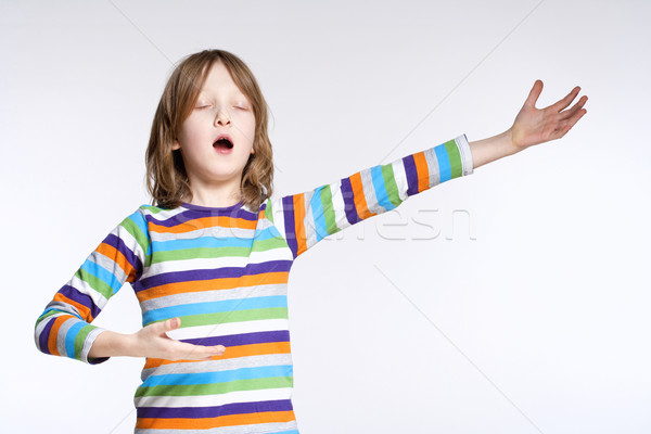 Stock photo: Portrait of a Boy Acting as Opera Singer