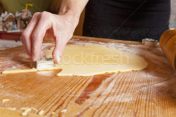 Christmas Baking - Shaping Dough with Forms Stock photo © courtyardpix