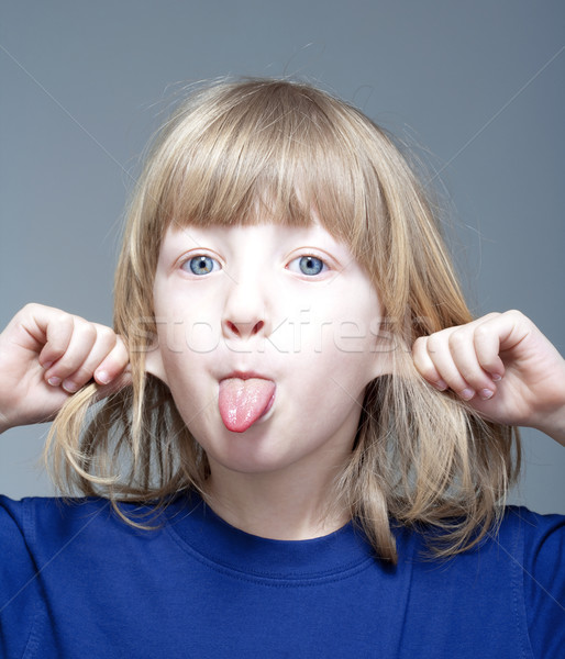 boy sticking out tongue Stock photo © courtyardpix