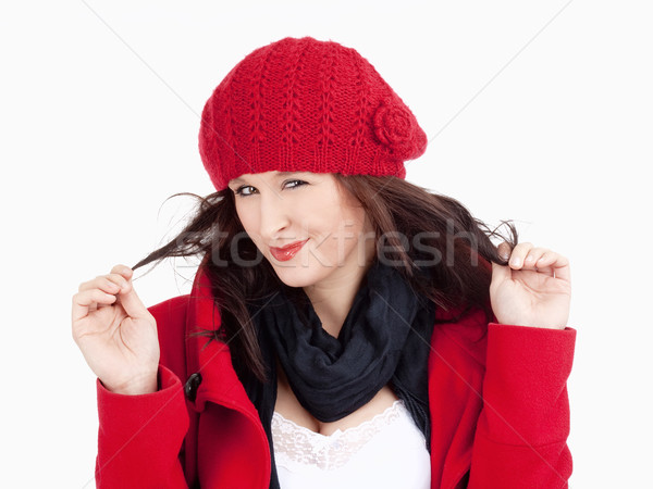 Young Woman in Red Coat and Cap Smiling  Stock photo © courtyardpix