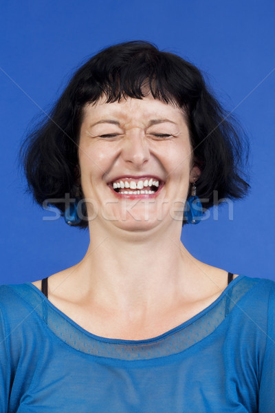 Portret femeie parul inchis la culoare râs Imagine de stoc © courtyardpix