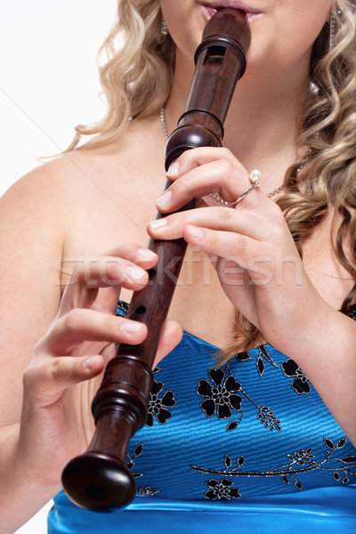 Kobiet muzyk niebieski sukienka gry flet Zdjęcia stock © courtyardpix