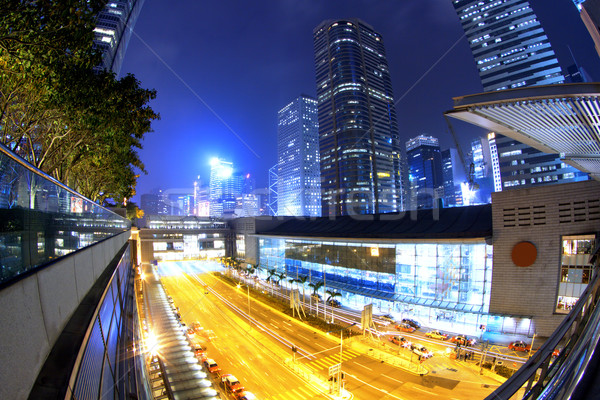 Hongkong város városkép éjszaka üzlet épület Stock fotó © cozyta