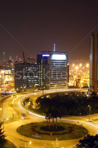 Körforgalom éjszakai város égbolt autó fény utca Stock fotó © cozyta