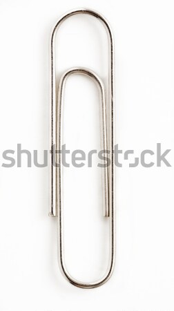 Large paper clip close-up isolated on white clipping path. Stock photo © cozyta