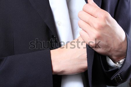 businessman hand in  pocket of a jacket  Stock photo © cozyta