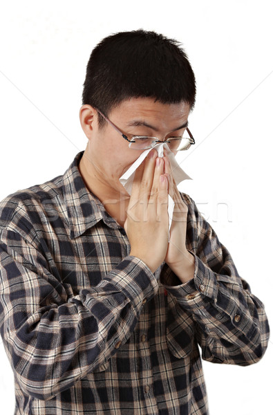 Młody człowiek zimno dmuchanie nosa tkanka człowiek zdrowia Zdjęcia stock © cozyta