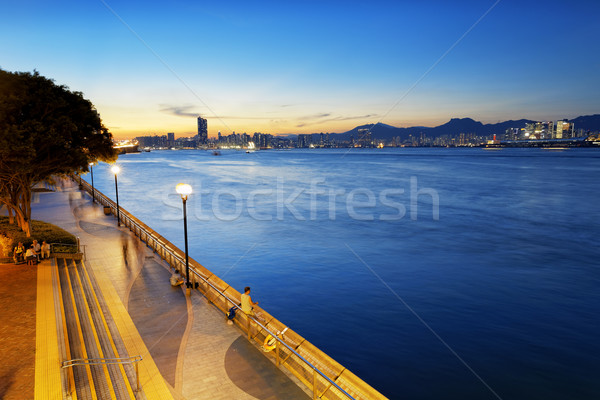 Coucher du soleil bord de l'eau promenade Hong-Kong bâtiment paysage Photo stock © cozyta