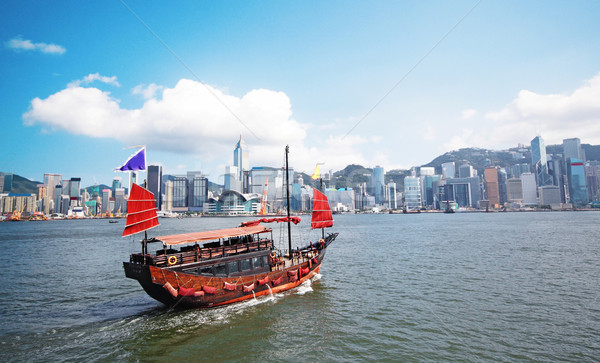 Junk boat with tourists in Hong Kong Victoria Harbour Stock photo © cozyta