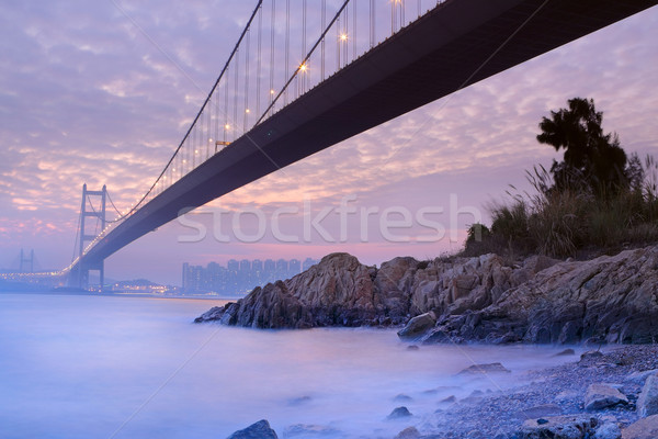 Brücke Sonnenuntergang Moment Himmel Wasser Gebäude Stock foto © cozyta