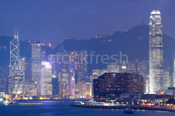 éjszaka Hongkong modern város Ázsia égbolt Stock fotó © cozyta
