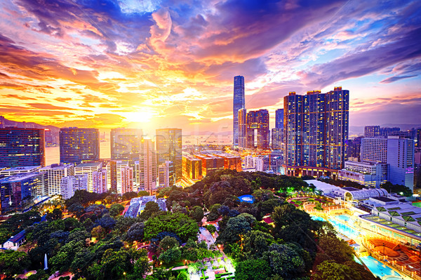 Hongkong Skyline Sonnenuntergang Gebäude orange städtischen Stock foto © cozyta