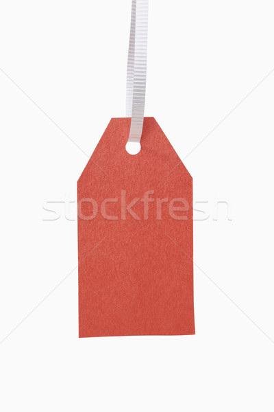 Cadou etichetă roşu Crăciun Imagine de stoc © CrackerClips