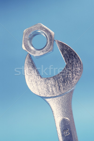 Llave metal tuerca fotografía mecánico Foto stock © CrackerClips