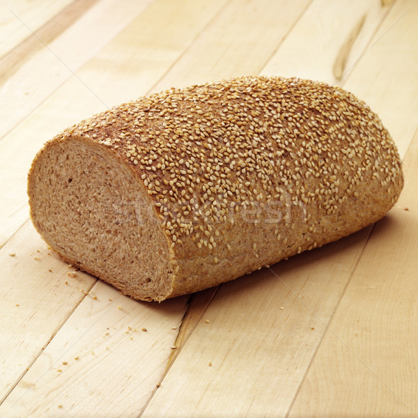 Brot Sesam geschnitten Hälfte Licht Holz Stock foto © crisp