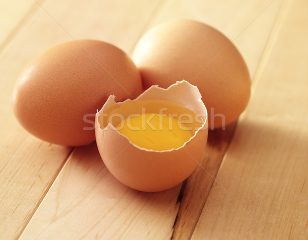 three eggs one broken Stock photo © crisp