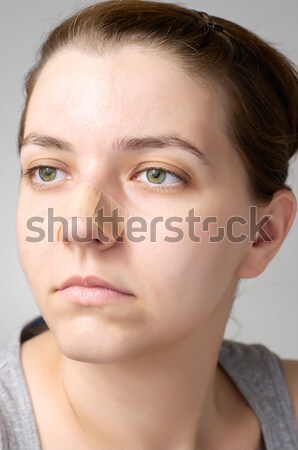 Closeup of a plaster on female nose Stock photo © CsDeli