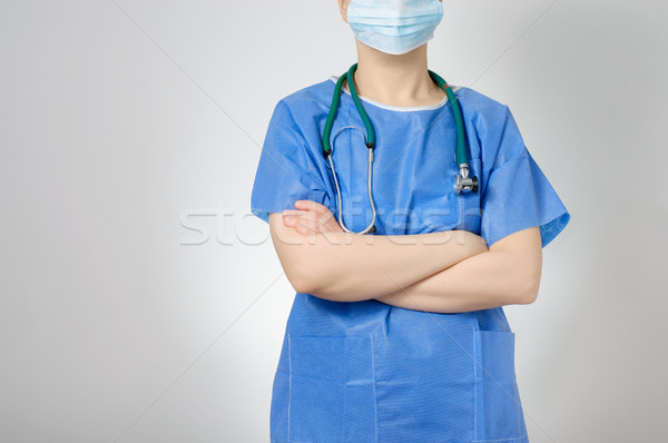 Medico braccia femminile cross blu maschera Foto d'archivio © CsDeli