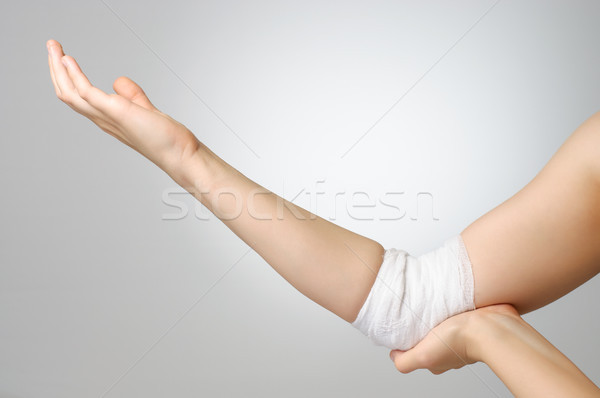Injured elbow with bandage Stock photo © CsDeli