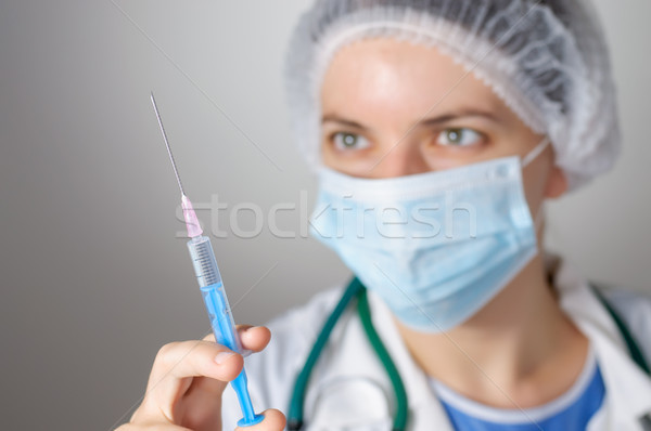 Female doctor with syringe Stock photo © CsDeli