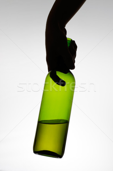 Female hand holding a bottle Stock photo © CsDeli