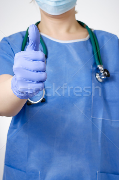 Doctor with thumbs up gesture Stock photo © CsDeli