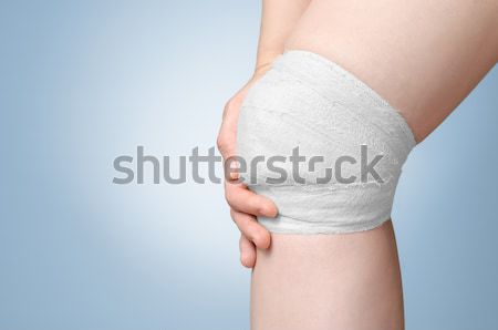 Ranny kolano bandaż bolesny biały strony Zdjęcia stock © CsDeli